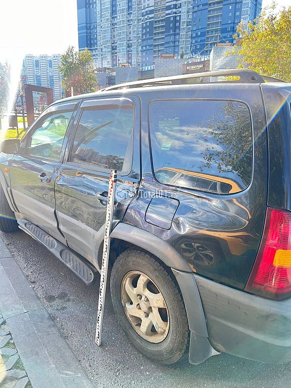 Фото Mazda Tribute 10