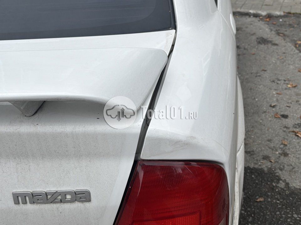 Фото Mazda Familia 4
