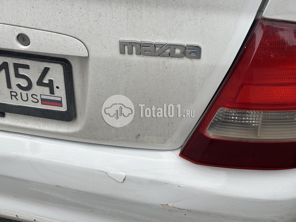Фото Mazda Familia 12