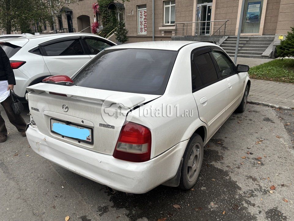 Фото Mazda Familia 44