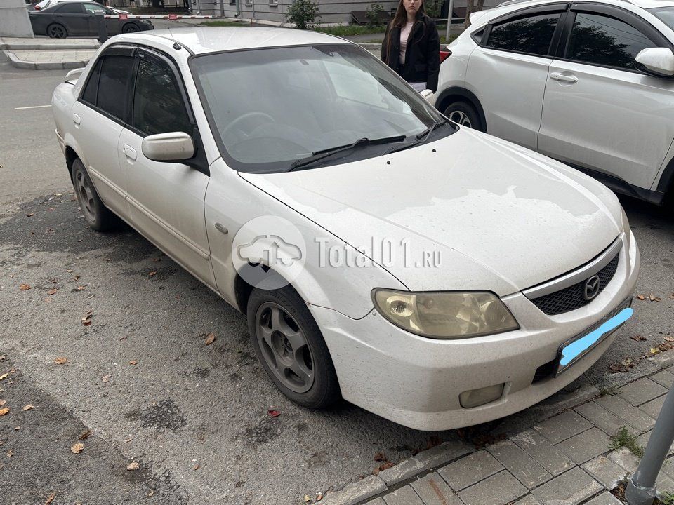 Фото Mazda Familia 46