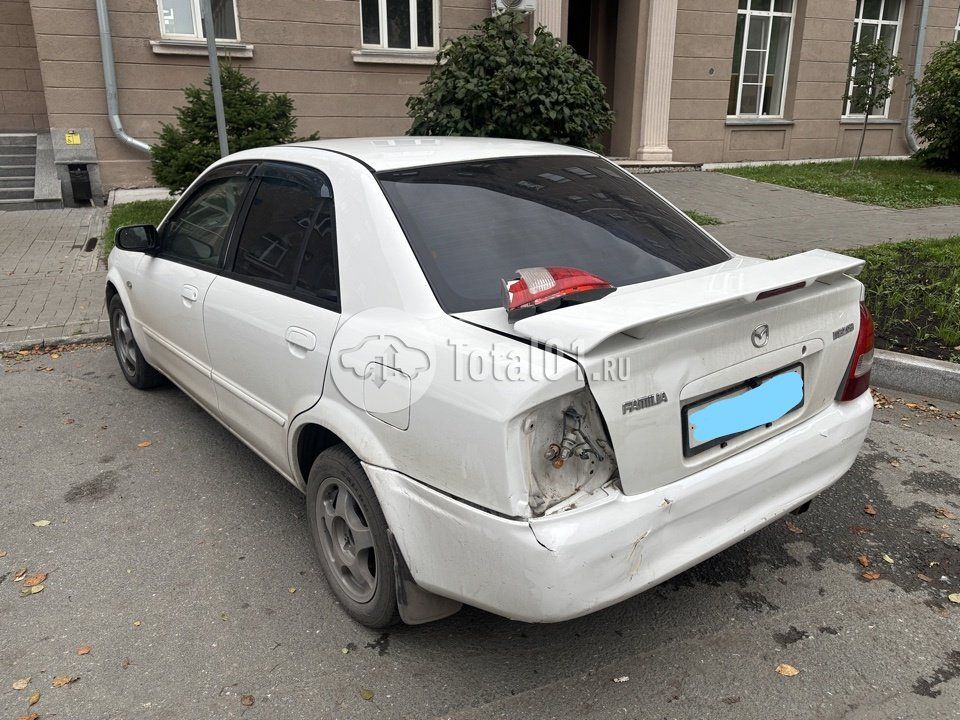 Фото Mazda Familia 48