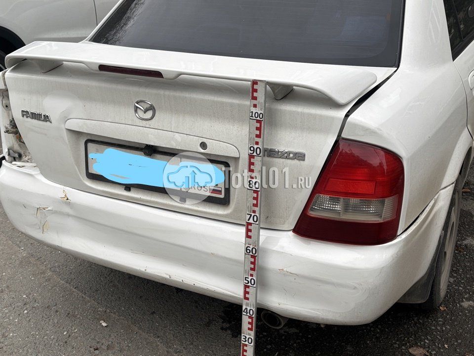 Фото Mazda Familia 52