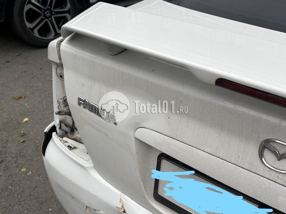 Фото Mazda Familia 56