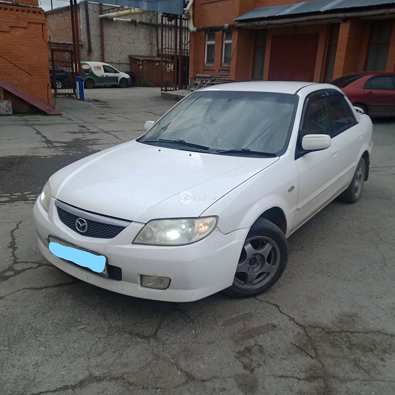 Фото Mazda Familia 60