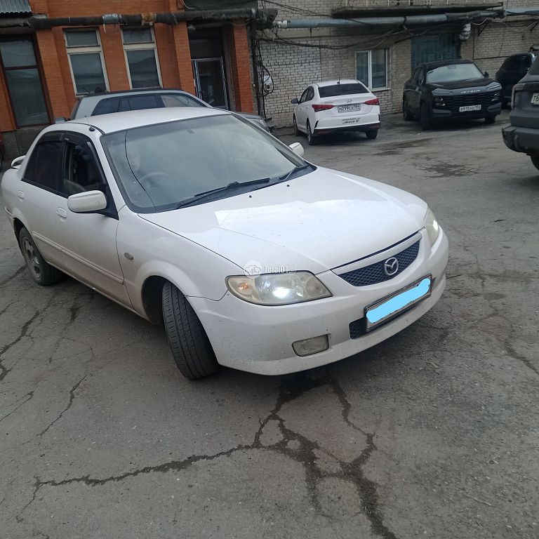 Фото Mazda Familia 62