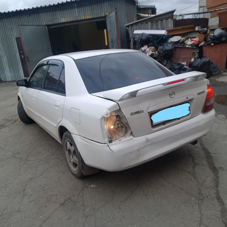 Фото Mazda Familia 66