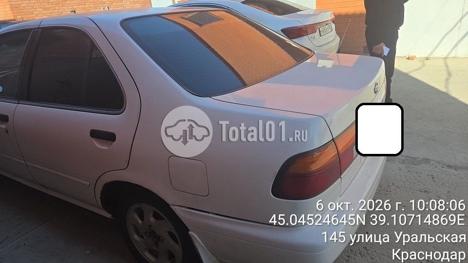 Фото Nissan Sunny 14