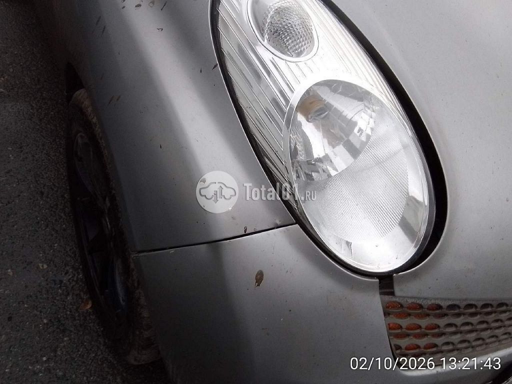 Фото Nissan Micra 38