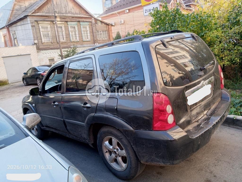 Фото Mazda Tribute 8