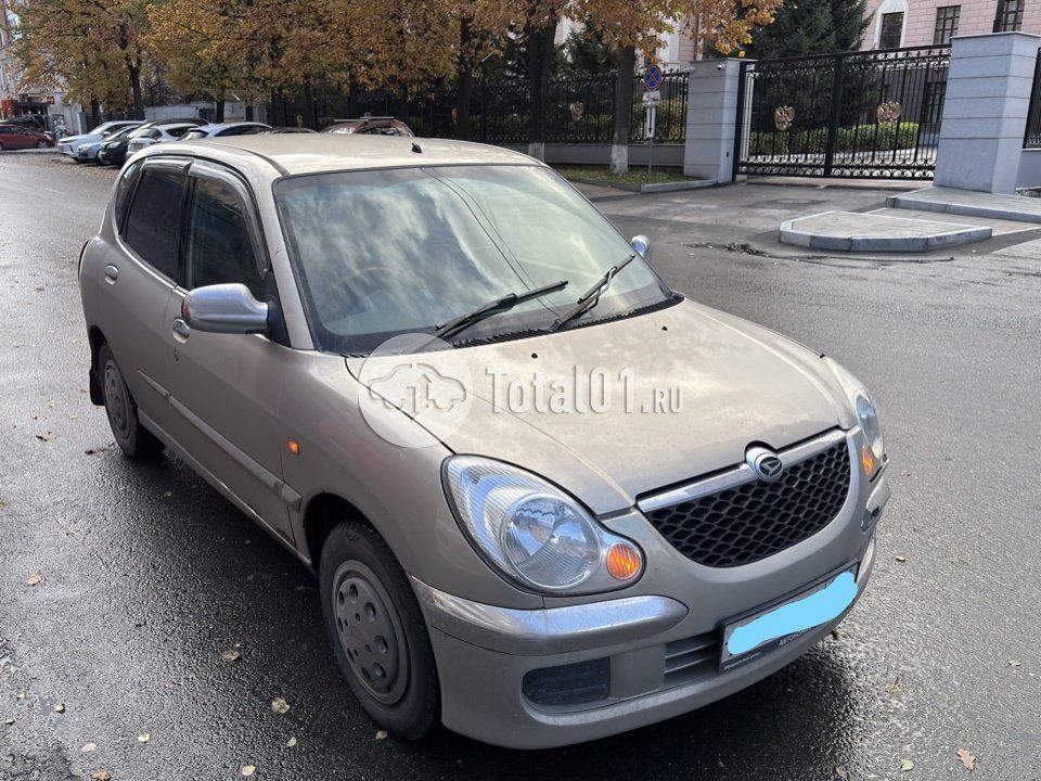 Фото Daihatsu Storia 82