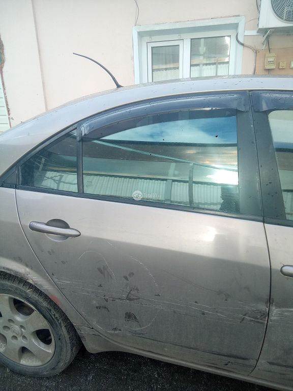 Фото Nissan Primera 6