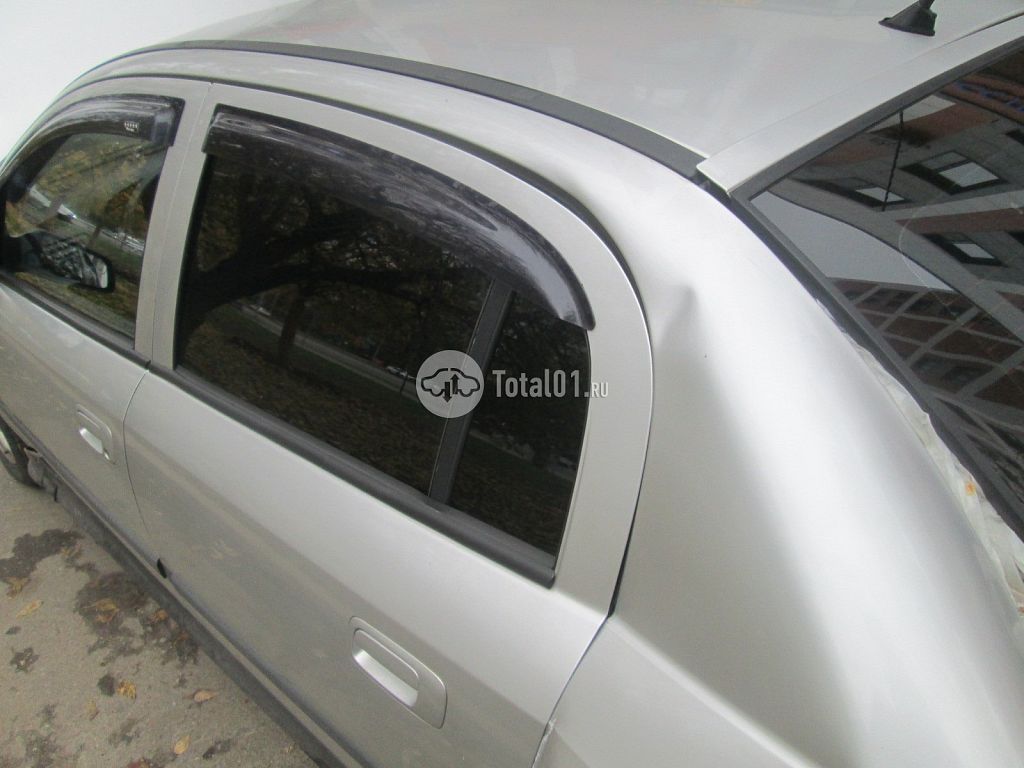 Фото Opel Astra 44