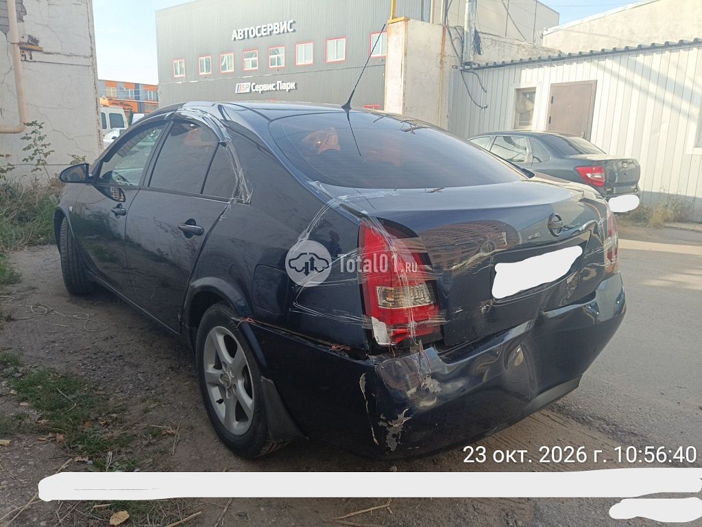 Фото Nissan Primera 6