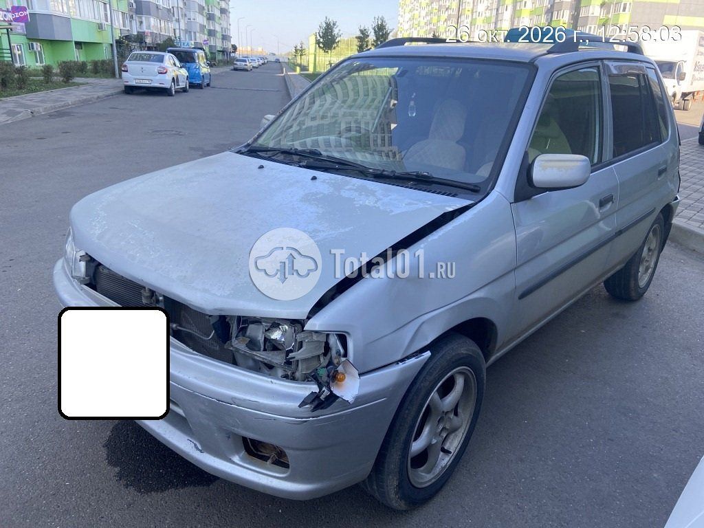 Фото Mazda Demio 6
