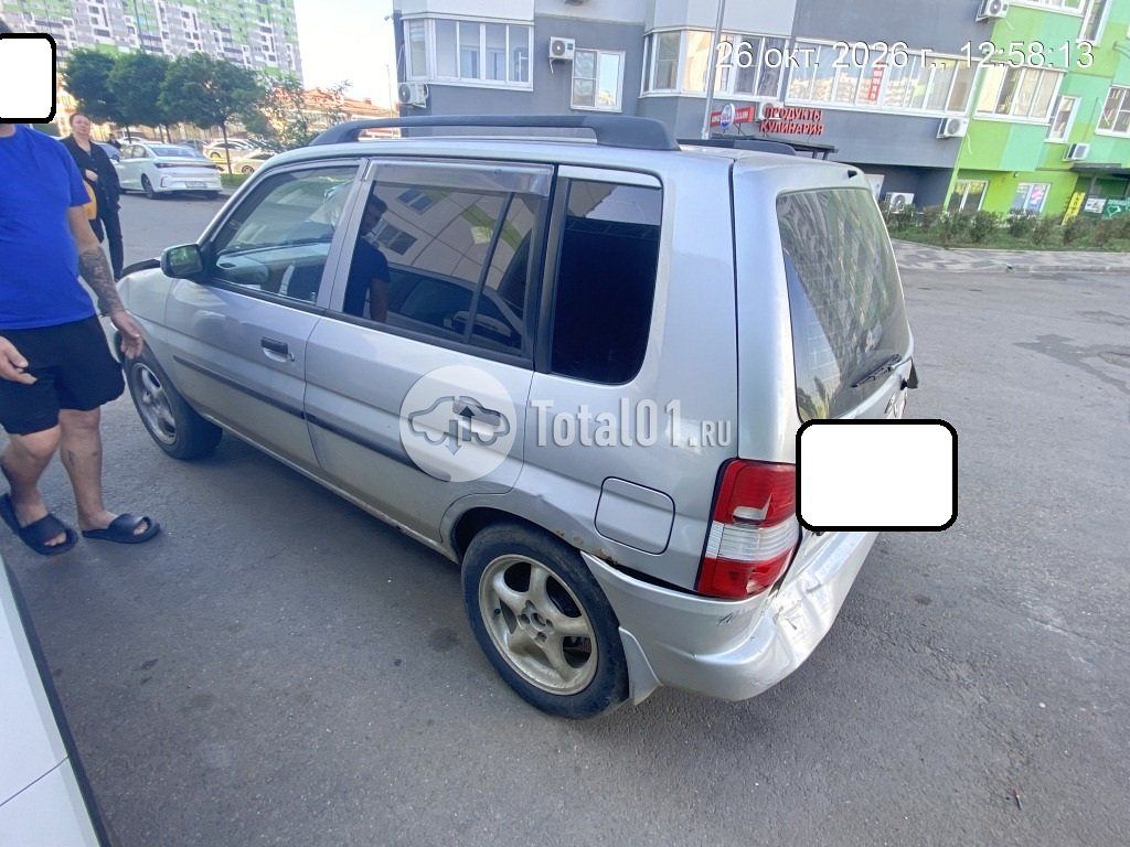 Фото Mazda Demio 8
