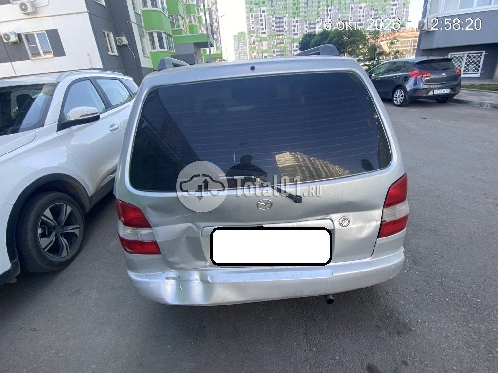 Фото Mazda Demio 10