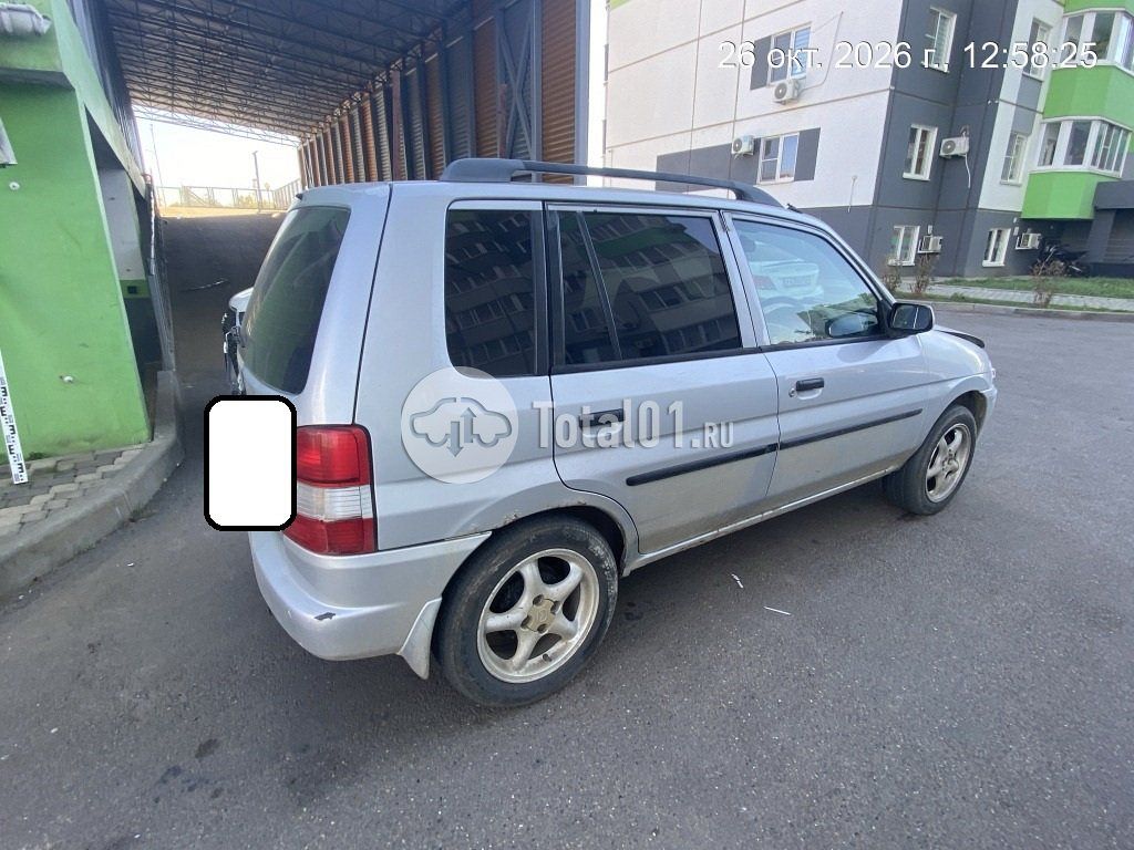 Фото Mazda Demio 12