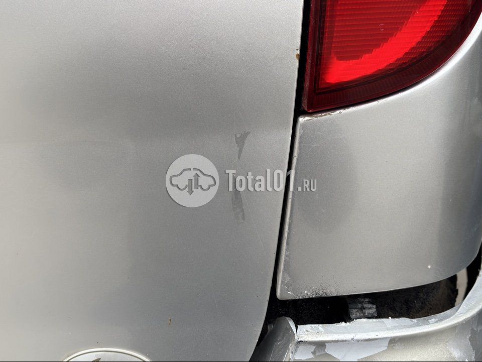 Фото Nissan Tino 14