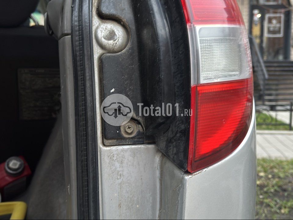 Фото Nissan Tino 34
