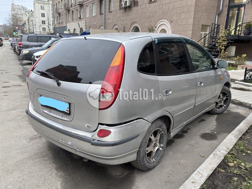 Фото Nissan Tino 102