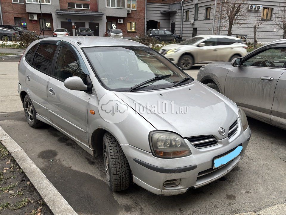 Фото Nissan Tino 104