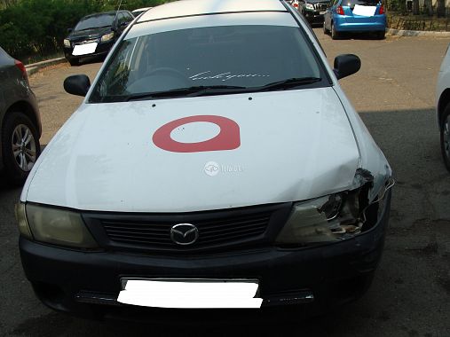 Купить Mazda 323