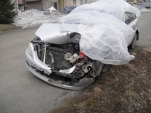 Купить Mazda Familia